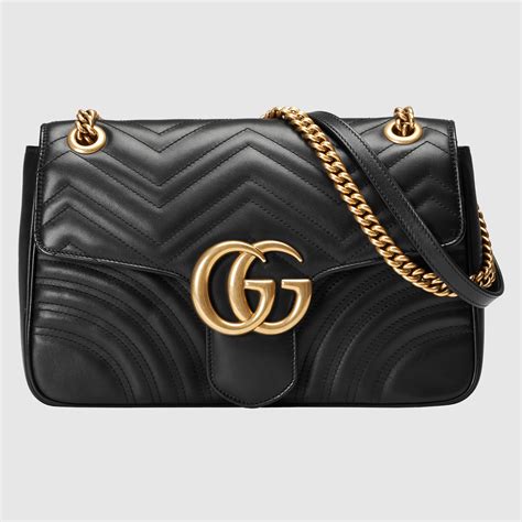 bolsa gucci negra vintage|Bolsa para el hombro mediana GG Emblem inpiel negra.